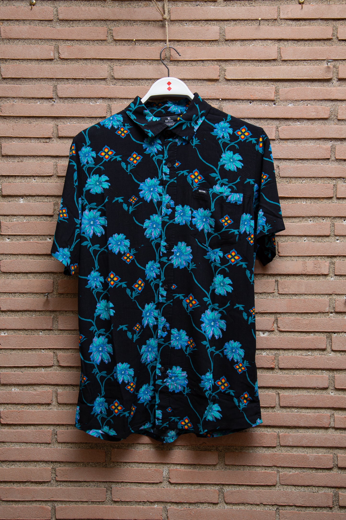 Rip Curl - camicia viscosa nera fiori azzurri