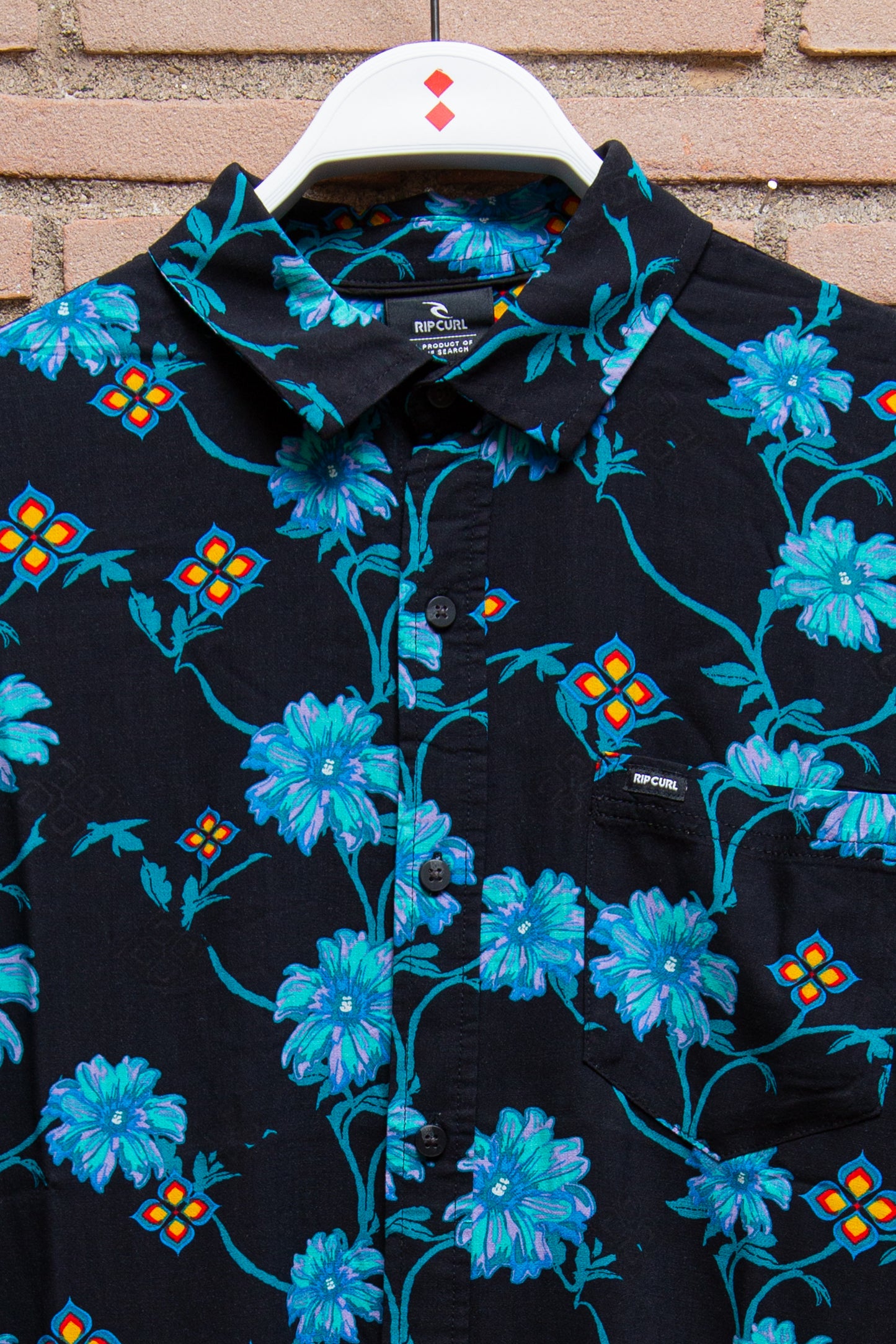 Rip Curl - camicia viscosa nera fiori azzurri